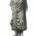 A gray schist figure of Buddha, Gandhara, 2nd-3rd century